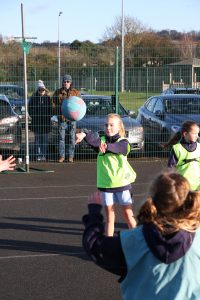 girl throwing a ball