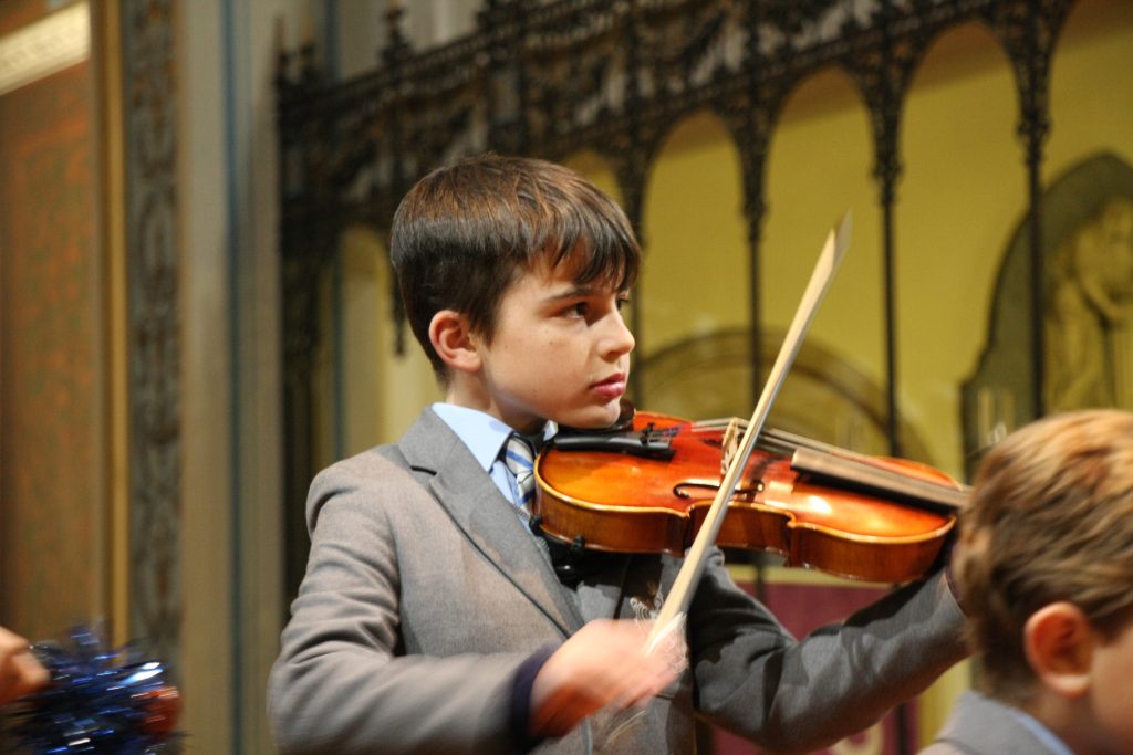 boy playing the violin