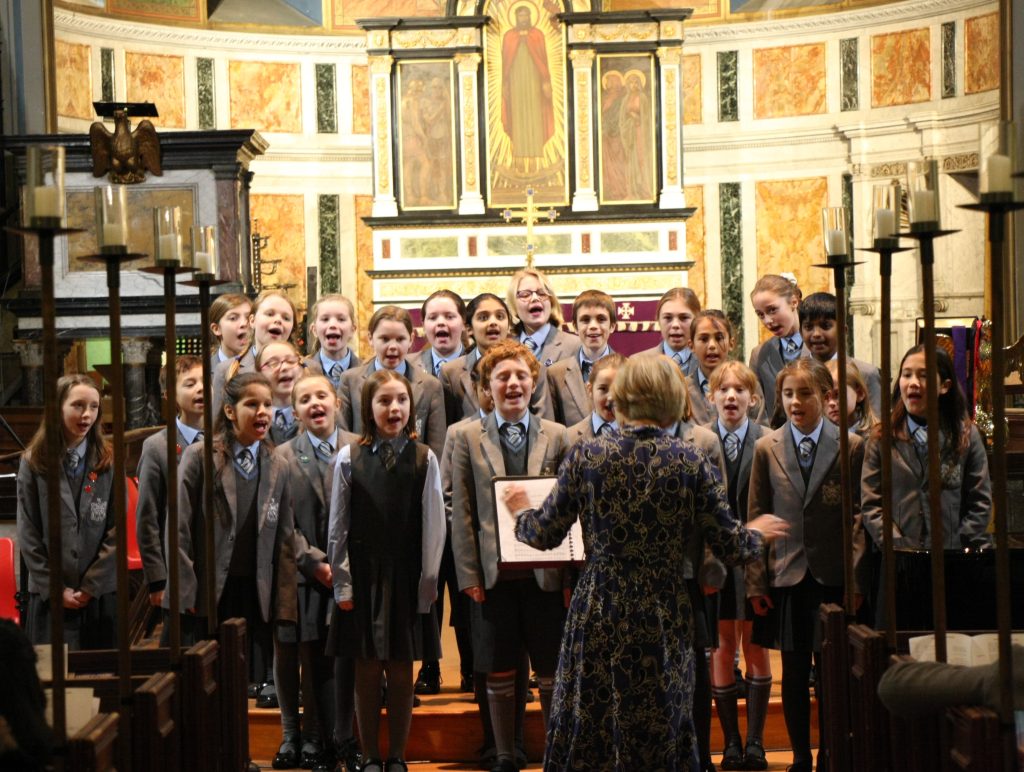 children singing in a church