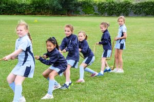 students in a game of tug of war