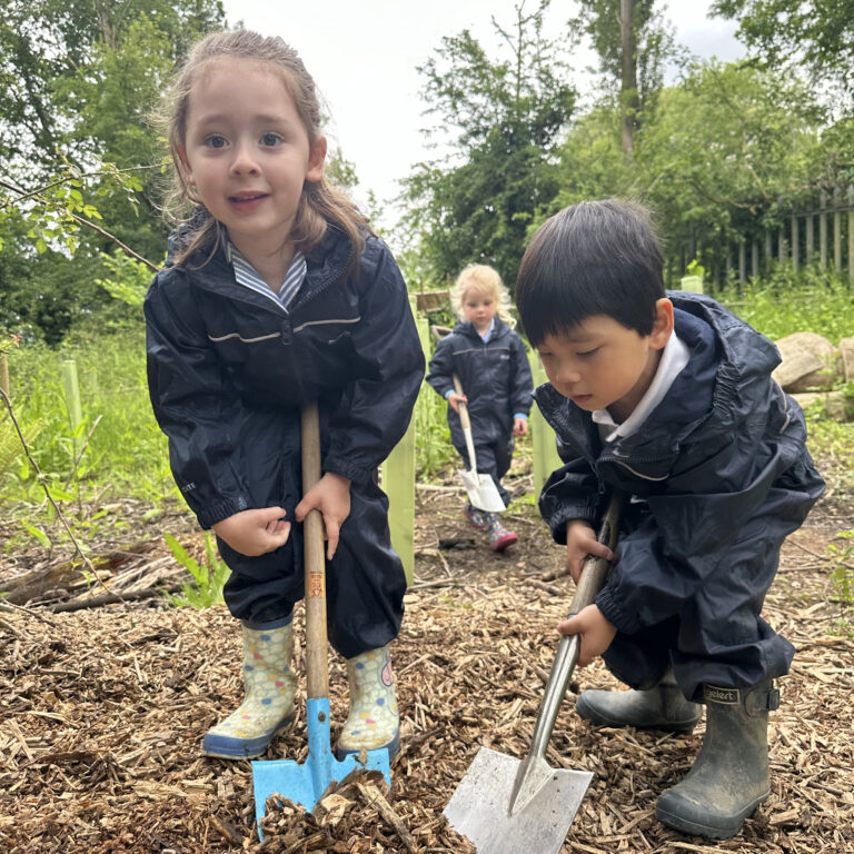 nursery students digging